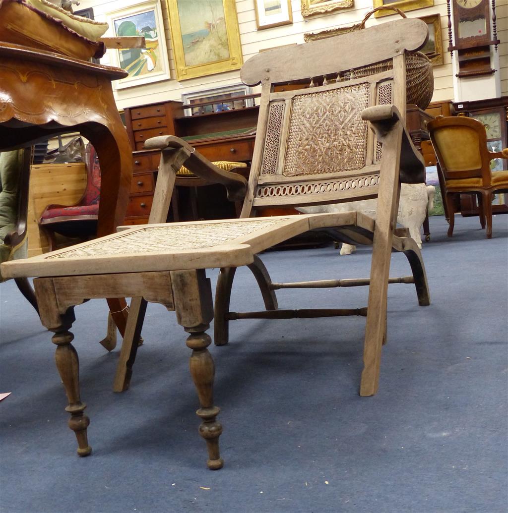 An Anglo Indian caned bleached hardwood steamer chair